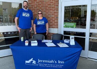 Attorney Ashley Coffey joined her Mirick colleague Reid Wakefield in support of Jeremiah's Inn Annual Food Drive.